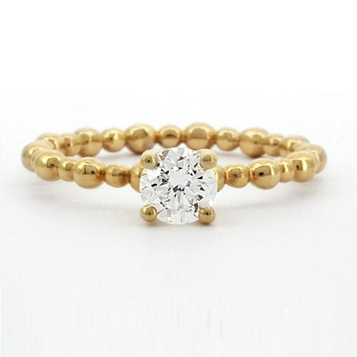 Striking-Engagement-Rings-for-Off-Beat-Brides-Rounded-Band-Solitaire