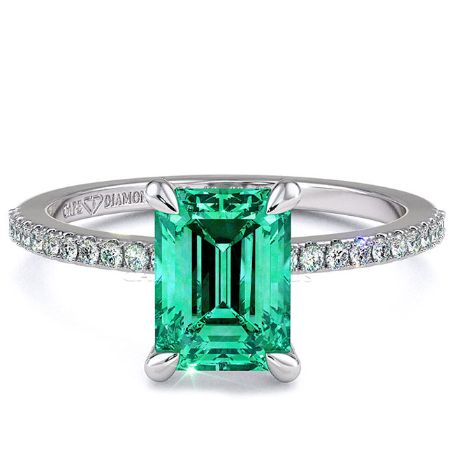 Side Stone Emerald Engagement Rings
