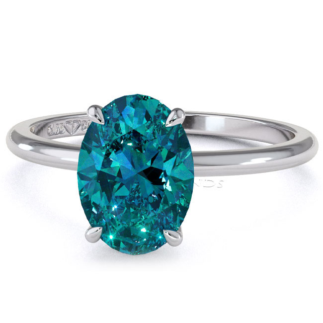 Solitaire Teal Sapphire Engagement Rings